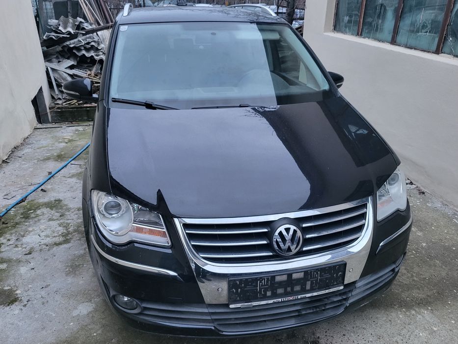 Touran 7 locuri Anul 2010 1.9 tdi 105cp 6 viteze Carlig Jante