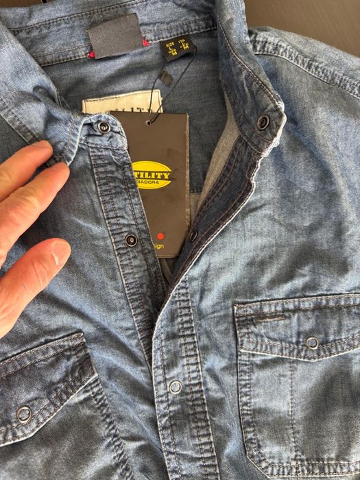 Haine de firma marca Diadora