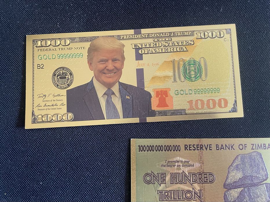 Bancnote 100 dolari aurite