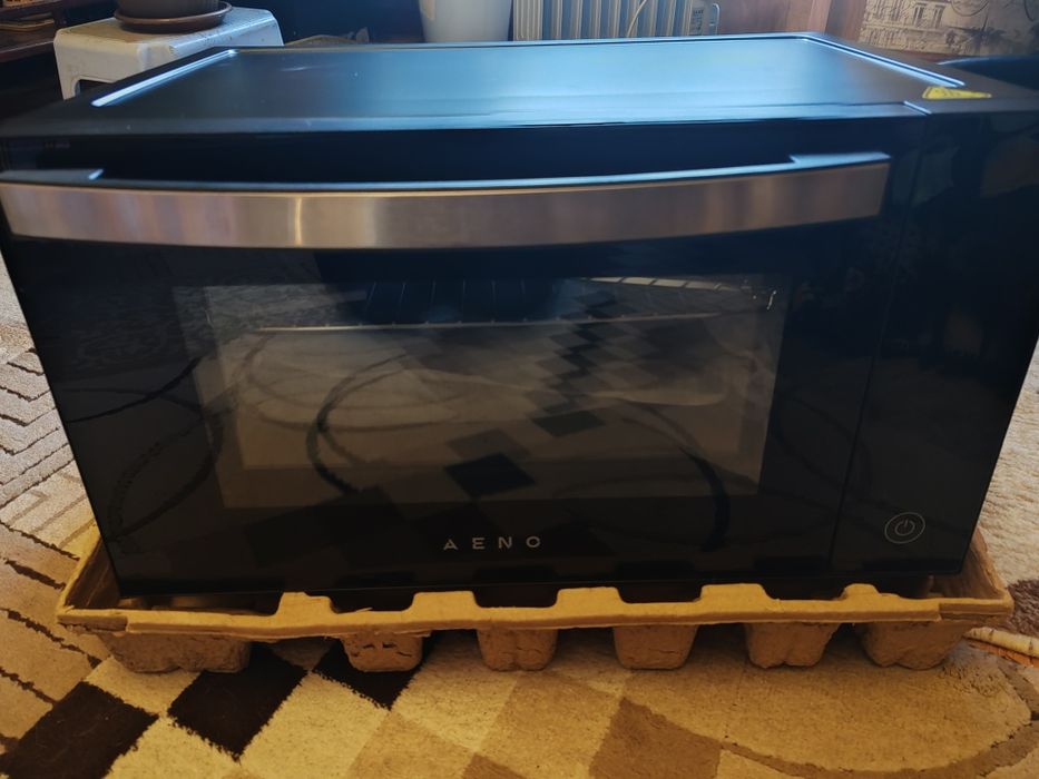Продаю мини-печь АЕNO EO1