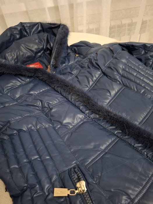 Продам пуховик зимний