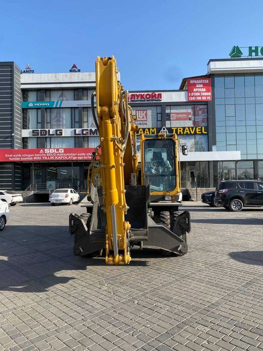 Колесный экскаватор SDLG   0,6 м³