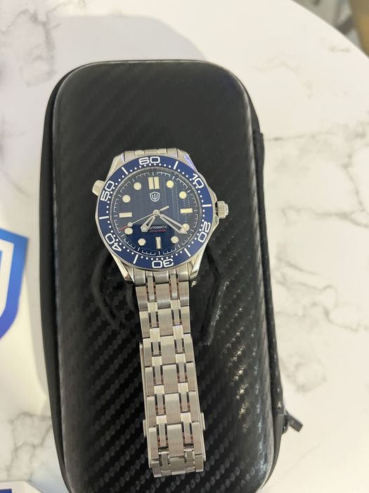 Ceas Watchdives , automatic nou , pret 500 ron .