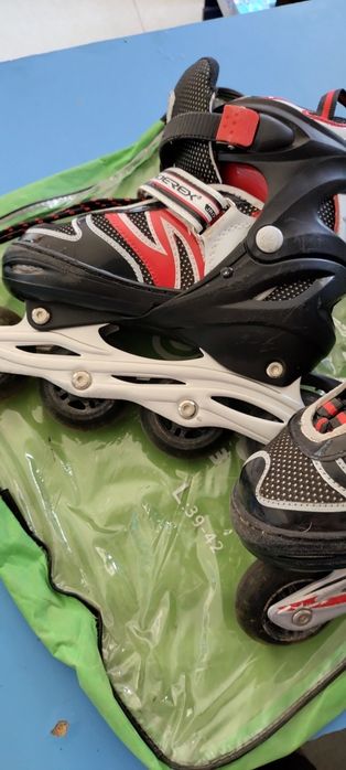 Роликовые коньки