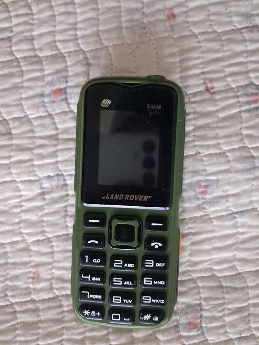 Кнопочный телефон Лэнд Ровер