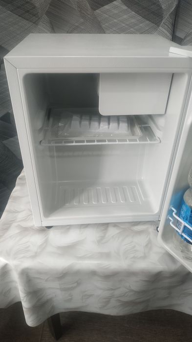 Новый холодильник.