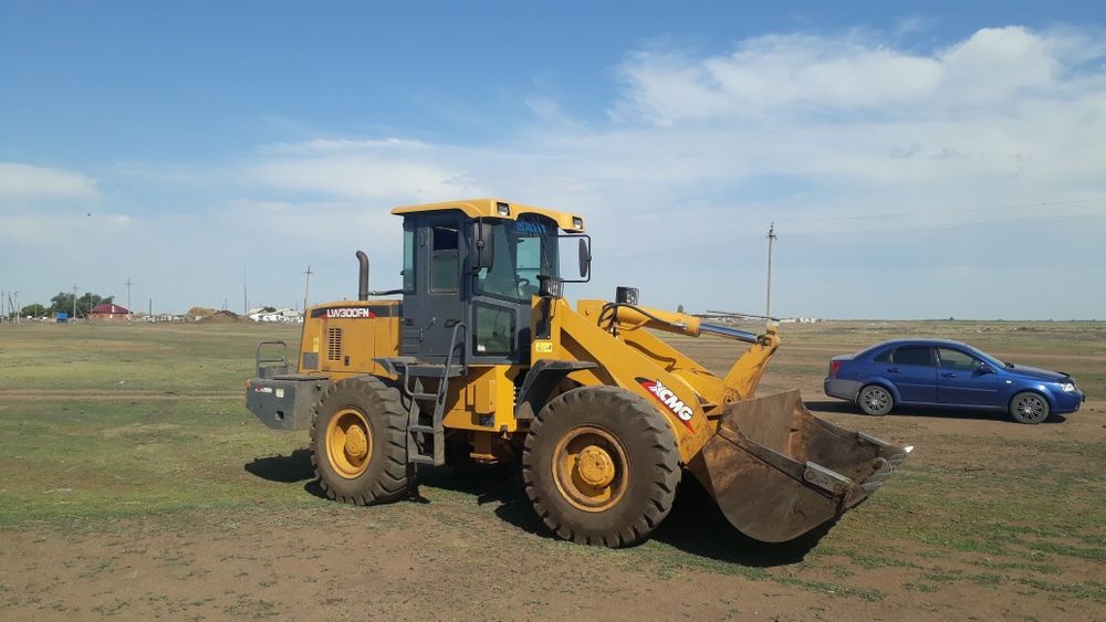 Услуги погрузчика и  камаза