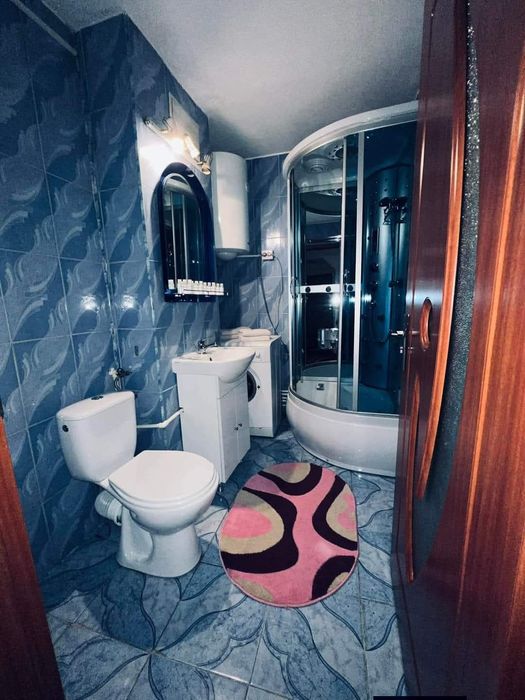 Vând apartament 2 camere+ teren in spatele blocului