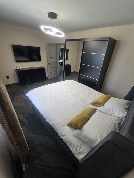 Vand apartamamet 2 camere,living bucătărie open space,bloc nou — fotografia 3
