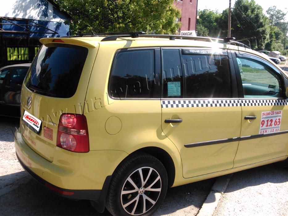 Спойлери заден капак и вежди фар за VW Touran