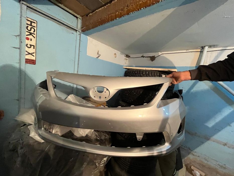 Передний бампер Toyota corolla