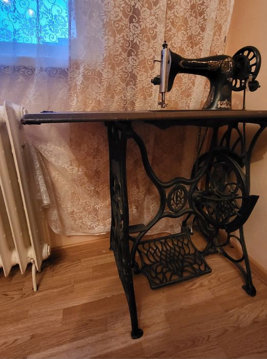 Mașina de cusut Singer