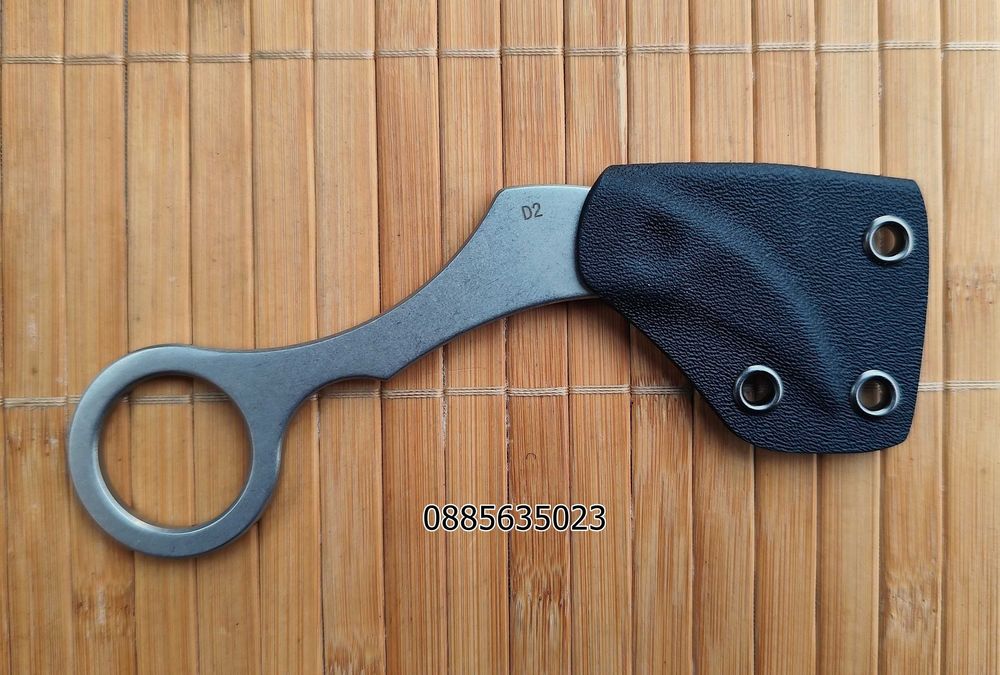 Карамбит с фиксирано острие