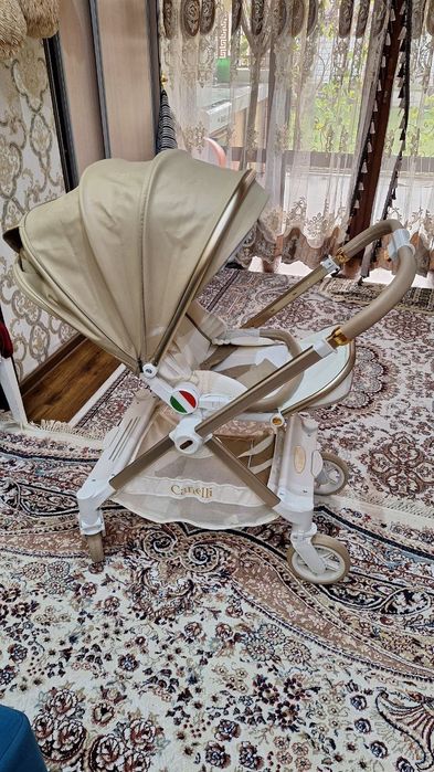 Коляска   йэнги   холати  зор.  Келишамиз