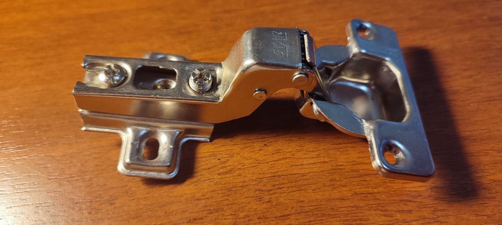 Петли мебельные "Star" с обратной пружиной.