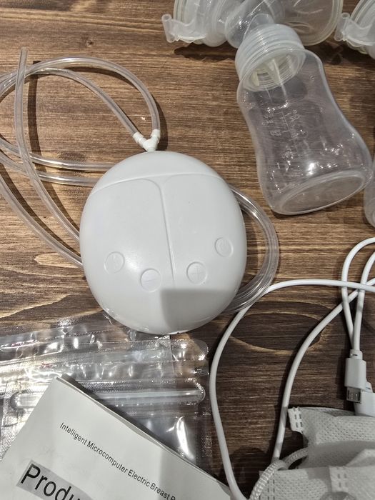 Молокоотсос Mom Help BP210 в идеале с вкладышами