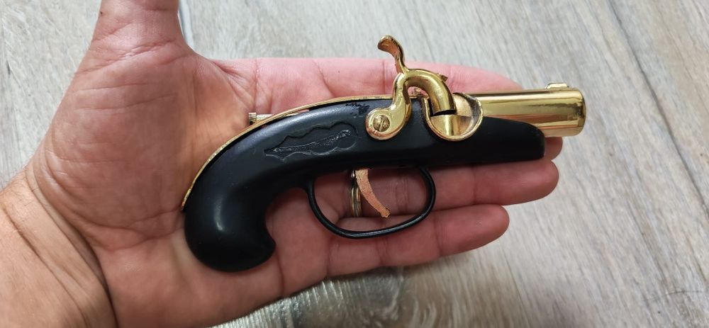 bricheta sub forma de pistol