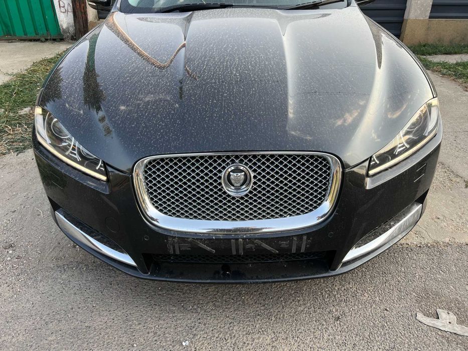 Aripa dreapta fata Jaguar XF facelift 2011 2016 neagra faruri bi-xenon