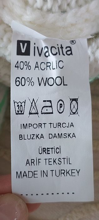 Продам женский свитер.  (60%Шерсть)