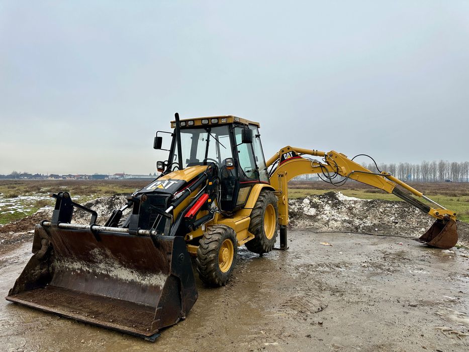 Buldoexcavator Cat 428C