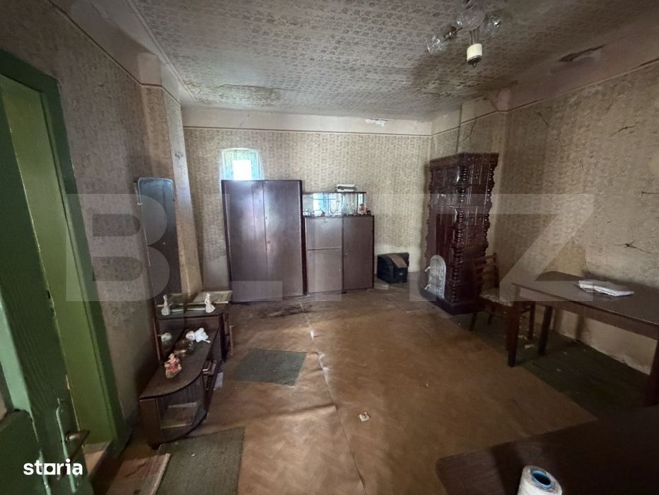 Casa cu 3 camere si un teren in suprafata de 1900 mp