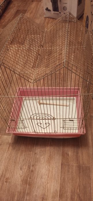 Для попугаев клетка