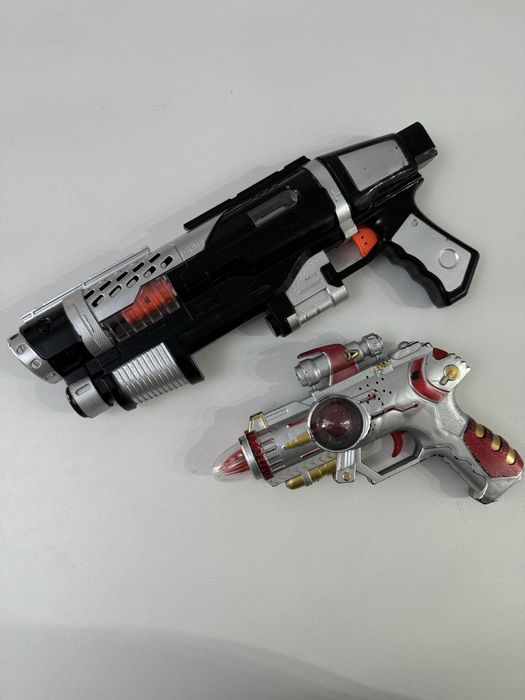 Рыбки игрушки пистолеты машинки