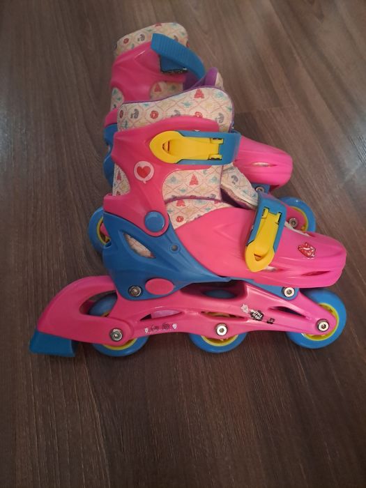 Роликовые коньки