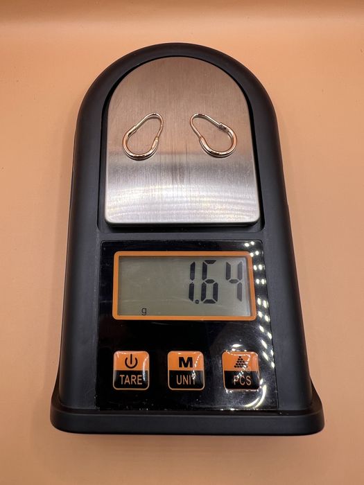 Продам золотые серьги.