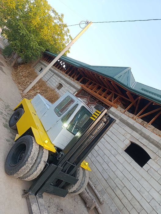 Погрузчик Кара сотилади холати алооо бенз Андижан матор газ 51 расхот