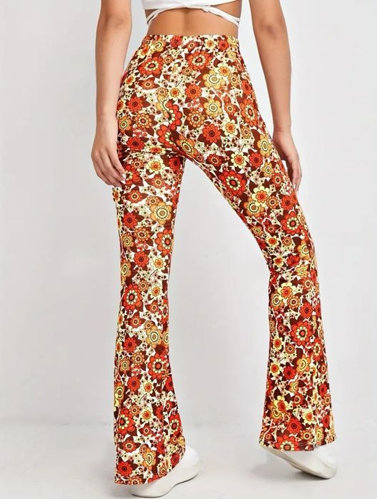 Pantaloni cu talie înaltă și imprimeu floral, model evazat