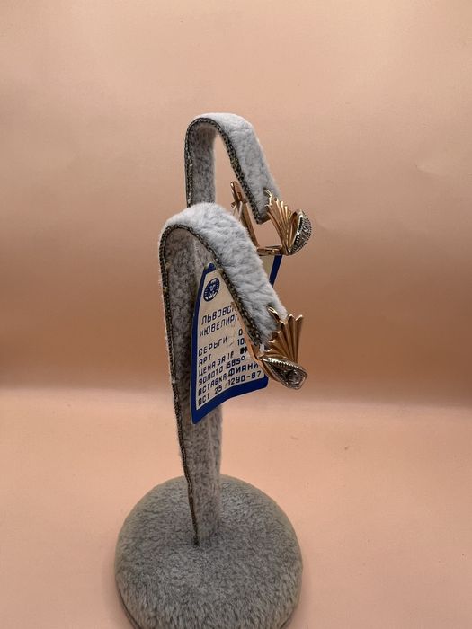 Продам золотые серьги