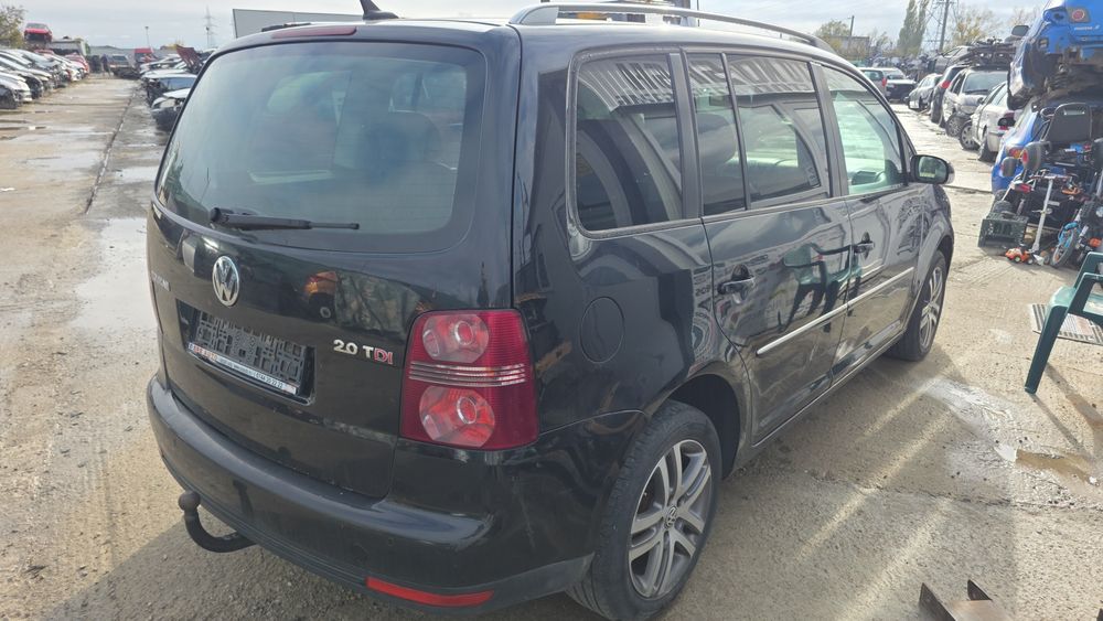 Bara capota trager far radiatoare usa oglinda Volkswagen Touran piese