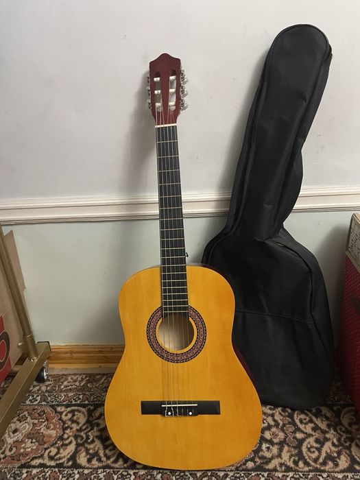 Gitara holati idelaniy taxtali