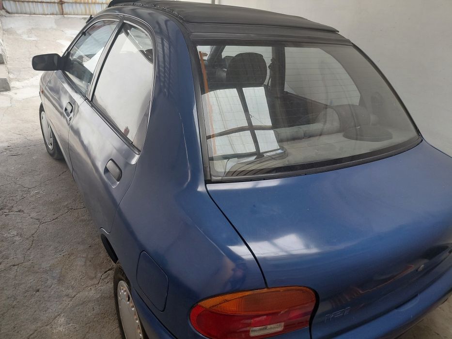 Продам Mazda 121