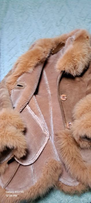 Одежда женская дубленка