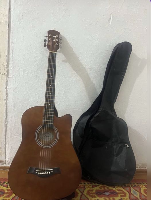 38 размер Гитара холати яхши айиби иук.