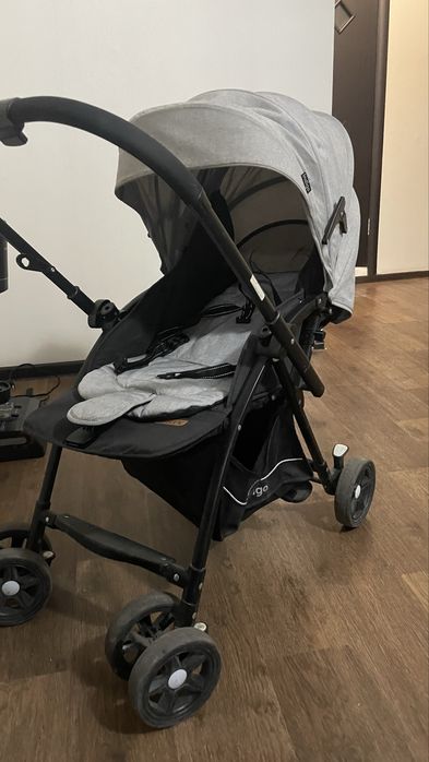 Продам коляску б/у и детский стульчик+ходунок