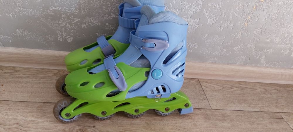 Роликовые коньки