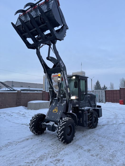 Фронтальный погрузчик 938