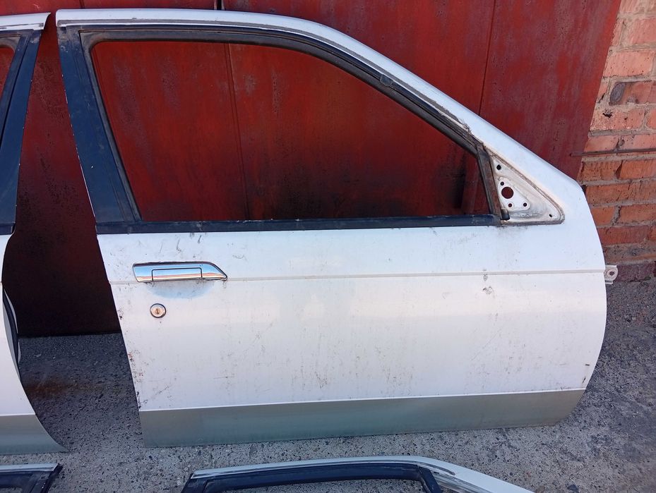 Двери Nissan Bluebird U14