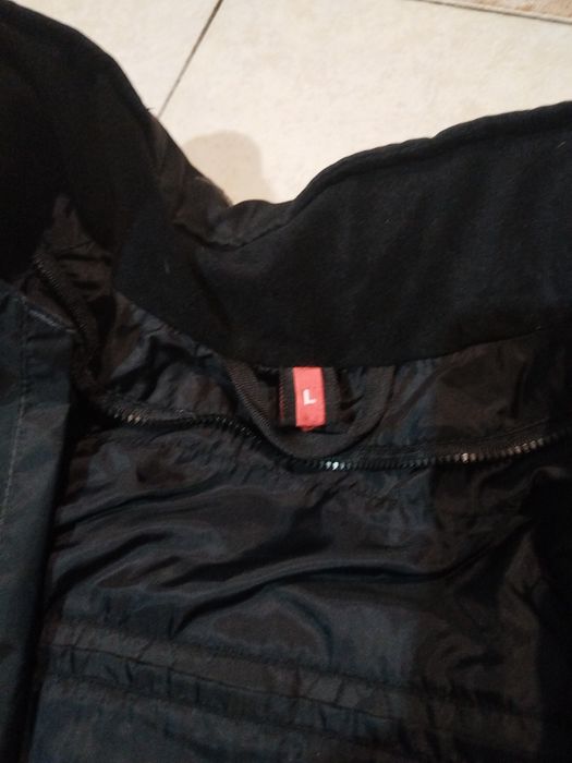 Моториско яке, не е носено никога, просто е купено и седи в гардероба.