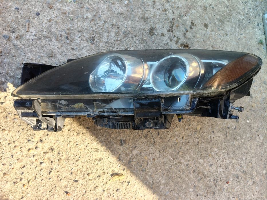 Far xenon Mazda cx 7 an 2008