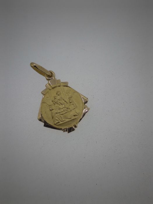 Pandantiv cu doua fete aur 18k 1.24gr (r)