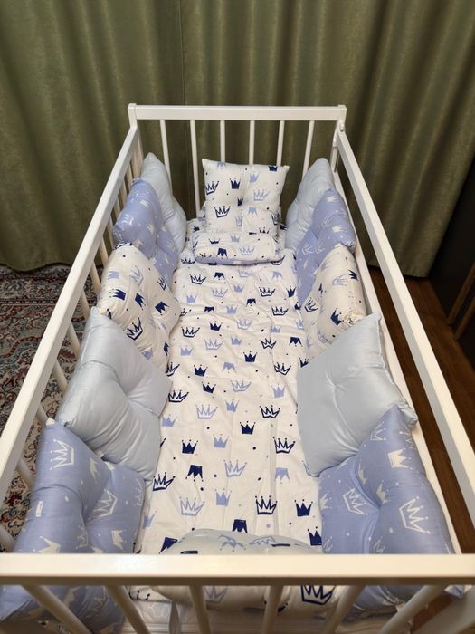 Кроватка детская с маятником