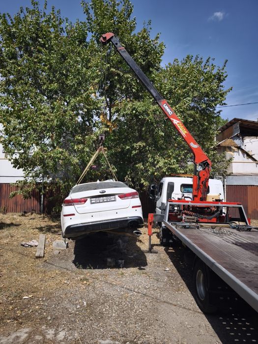 Грузовой эвакуатор манипулятор
