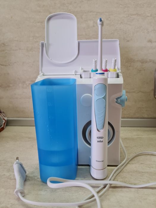 Braun water jet система за почистване на зъби