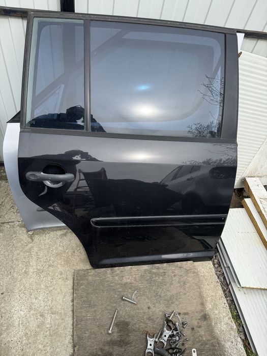 Usi , portiere touran