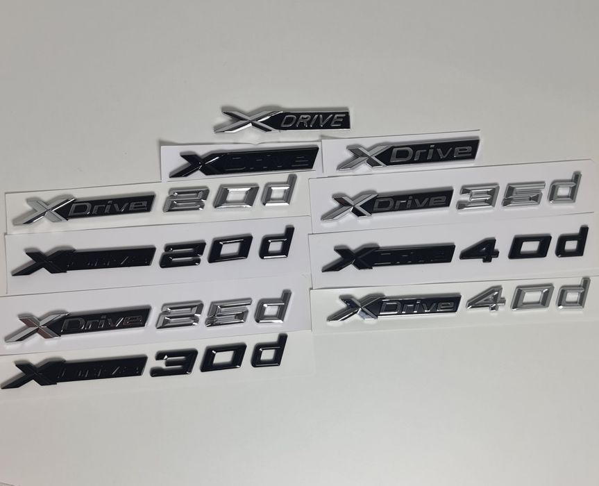 Emblema-Sigla-Logo-Stema-Xdrive-Bmw-20d-30d-35-40d-X1-X3-X4-X5-X6-F36-F32-F01-F25-F26-G01-G02-G11-G30-G20-F10-F30-E70-E71-F15-F16-G05-G06-Negru-Lucios