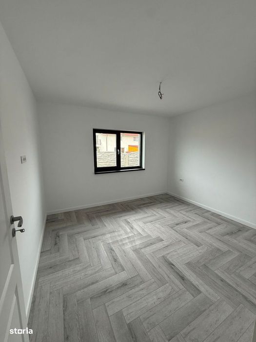 Casa pe parter cu 4 camere , incalzire in pardoseala , teren 400 mp